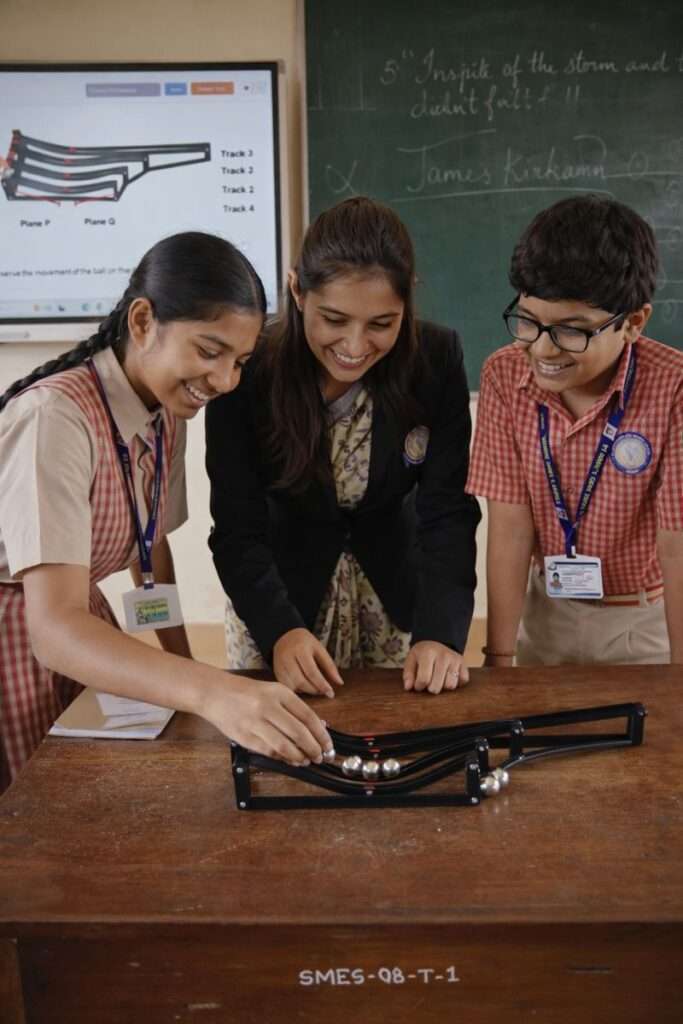 Students performing hands-on science experiments with Xperimentor in India